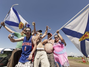 Nova Scotians fly their flag as they party in the campsite during Big Valley Jamboree 2016 in Camrose on Friday, July 29, 2016.