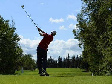 Brock Mackenzie makes a tee shot on the seventh hole during Round 3 of the Syncrude Oil Country Championship at Edmonton's Glendale Golf & Country Club on July 30, 2016.