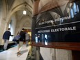 People arrive to an electoral reform committee on Parliament Hill in Ottawa on July 7, 2016.