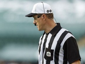Alan Eck, the first NFL official to participate in an officials exchange, works the CFL game between the Edmonton Eskimos and the Ottawa Redblacks at the Brick Field at Commonwealth Stadium in Edmonton on Saturday, June 25, 2016.
