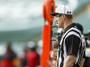 Alan Eck, the first NFL official to participate in an officials exchange, works the CFL game between the Edmonton Eskimos and the Ottawa Redblacks at the Brick Field at Commonwealth Stadium in Edmonton on Saturday, June 25, 2016. Ian Kucerak / Postmedia