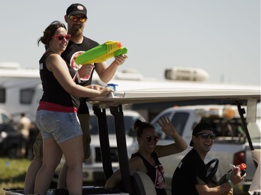 The Edmonton Sun promotion team rockets through the campsite during Big Valley Jamboree 2016 in Camrose, Alberta on Friday, July 29, 2016.