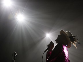 The Tragically Hip's Gord Downie, performs during the first stop of the Man Machine Poem Tour at the Save-On-Foods Memorial Centre in Victoria, B.C., Friday, July 22, 2016.