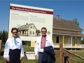 Former Alberta Premier Ed Stelmach and his wife Marie outside the 100-year-old house Ed's grandparents built. The house, now at the Ukrainian Cultural Heritage Village, will open with a ribbon-cutting ceremony Aug. 7 to mark the 125th anniversary of Ukrainians first arriving in Canada.