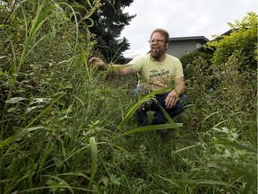 Craig Schlegelmilch poses for a photo in his naturalized front yard in the Duggan neighbourhood on Aug. 25, 2016.