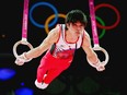 *** BESTPIX *** LONDON, ENGLAND - AUGUST 01:  Kohei Uchimura of Japan competes on the rings in the Artistic Gymnastics Men's Individual All-Around final on Day 5 of the London 2012 Olympic Games at North Greenwich Arena on August 1, 2012 in London, England.  (Photo by Ronald Martinez/Getty Images)