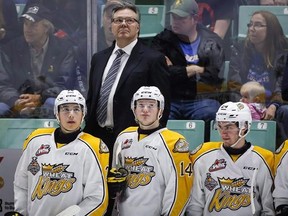 Brandon Wheat Kings head coach Kelly McCrimmon, top centre, looks to the scoreboard with his players during second period CHL Memorial Cup hockey action against the Rouyn-Noranda Huskies in Red Deer, Saturday, May 21, 2016. The Las Vegas expansion NHL team has hired Kelly McCrimmon as its assistant general manager on Tuesday. THE CANADIAN PRESS/Jeff McIntosh