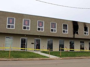 Police tape closes off a building at the corner of Manning Avenue and King Street on August 22, 2016. The night before, firefighters responded to a blaze in a top-floor room.