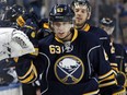 Buffalo Sabres' Tyler Ennis (63) celebrates his game-winning goal against the Los Angeles Kings during the third period of an NHL hockey game Tuesday, Dec. 9, 2014, in Buffalo, N.Y. Buffalo defeated Los Angeles 1-0.