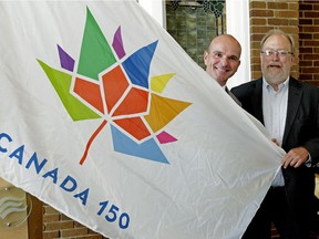 Edmonton Centre Liberal MP Randy Boisonnault, left, parliamentary secretary to the minister of Canadian heritage, and Edmonton Community Foundation CEO Martin Garber-Conrad launch the 150-day countdown to Canada's 150 birthday celebrations on Aug. 4, 2016.