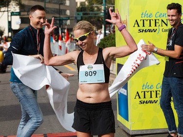 Dawn-Ladds Boyd reacts after winning the women's division of the Edmonton Marathon on Sunday, Aug. 21, 2016.