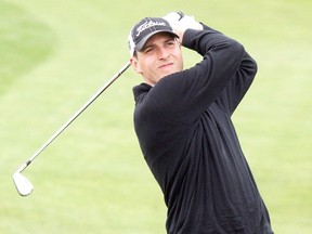 Dean Bicknell, Calgary Herald CALGARY AB: MAY 26, 2010--Jamie Kureluk from Cottonwood Golf and Country Club watches fairway shot on the second hole during second round action at the Alberta Open on Tuesday May 26 2010 at Carnmoney Golf Club in Calgary  Dean Bicknell / Calgary Herald) For Sports story by John Down  00027546A