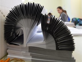 Ballots sit at the ready in the advance poll for the provincial election at McKernan Community Hall in Edmonton on Apr. 29, 2015.