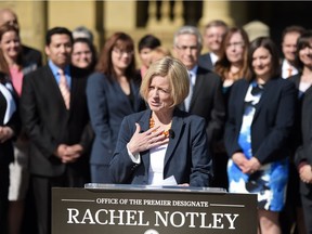 Alberta's NDP government, pictured before its first caucus meeting after winning the 2015 election, will do more harm than good to minimum wage workers by pushing ahead with plans to eventually reach a $15 per hour minimum wage, analysts from the Fraser Institute say in a op-ed.