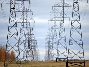 Power line towers march to the horizon along Anthony Henday Drive in Edmonton in a 2013 photo.