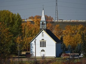 Autumn colours surround the Catholic Church at Lamoureux, across the river from Fort Saskatchewan on Oct. 2, 2015.