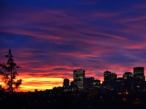 A spectacular sunset in 2015 shows off Edmonton's skyline. There is an ongoing debate in Edmonton about how much infill is the right fit for the city's older neighbourhoods.