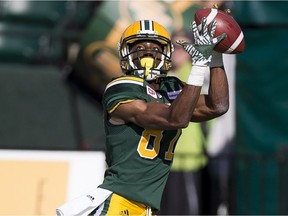 Edmonton Eskimos receiver Derel Walker makes a touchdown catch against the Hamilton Tiger-Cats during CFL action at Commonwealth Stadium on July 23, 2016.