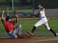Edmonton Prospects Nick Spillman (10) can't make a forced out on Swift Current Indians Shane Dokey (6), during playoff game 3 of WMBL final at Telus Field in Edmonton Saturday, August 13, 2016.