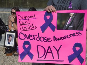 About 200 people gathered Wednesday on the steps of the Alberta legislature to mark International Overdose Awareness Day.