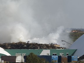 Smoke from a fire at a dump in northeast Edmonton led Alberta Health Services to issue a precautionary air quality advisory Tuesday night.