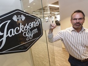 Bell Tower general manager Morley Barr poses for a photo in the brand new, and not yet open, Jackson's Gym in the Bell Tower in Edmonton, on Wednesday, Aug. 24, 2016. The gym's name was preserved and references George Jackson, who opened his first gym in Edmonton in 1923.