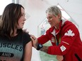 Lexi Blake, left, has her shirt signed by Jen Kish during a meet and greet at the Rockers Athletic Club in Edmonton, Alta., on Thursday, Aug. 25, 2016. Kish captained the Canadian women's sevens teams that won bronze in the 2016 Rio Olympics. (Codie McLachlan/Postmedia)
