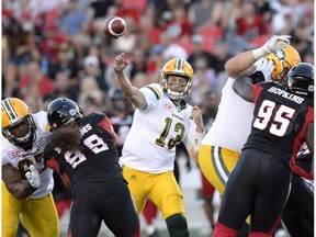 Edmonton Eskimos quarterback Mike Reilly (13) throws the ball during CFL action against the Ottawa Redblacks on Aug. 6, 2016 in Ottawa.