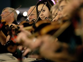 Martha Pitre and the New Brunswick Fiddlers perform at West Edmonton Mall on Wednesday Aug. 24, 2016. The Canadian Grand Masters Fiddling Competition is being held in Morinville this weekend.