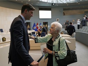 Former Edmonton city councillor Olivia Butti, who supports Northlands' Vision 2020 plan, speaks Wednesday with Mayor Don Iveson.