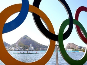 Rowing athletes pratise on Lagoa Rodrigo de Freitas, the site of the Olympic rowing venue, ahead of the 2016 Olympic Games on August 5, 2016, in Rio de Janeiro, Brazil.