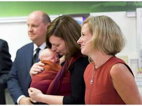 Premier Rachel Notley and associate health minister Brandy Payne with her five-week-old daughter Cassidy and Mike House, president and CEO of the Stollery Children's Hospital Foundation during an announcement Friday of the grand opening of the hospital's redeveloped pediatric operating suite on Friday, August 26, 2016 in Edmonton.