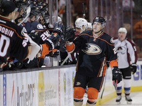 Anaheim Ducks' Shawn Horcoff celebrates his goal with teammates during the first period of an NHL preseason hockey game against the Colorado Avalanche, Thursday, Oct. 1, 2015, in Anaheim, Calif. Horcoff has been suspended for 20 games for violating the terms of the NHL's performance enhancing substances program.