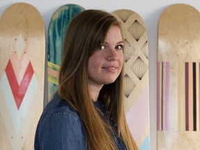 Hayley Wright with some of her skateboard art.