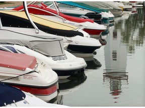 Boats are docked in a marina at Sylvan Lake.