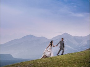 Chris and Joanne Pawluk literally climbed a mountain during their adventure session. Something they surely couldn't have made time for on their wedding day.