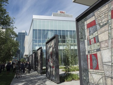 Today marks a construction milestone of the new Royal Alberta Museum. Ernestine Tahedl, is the mosaic panel artist who created the nine panels that previously adorned the Canada Post building on the same site. They have been refurbished and repurposed outside of the new RAM.