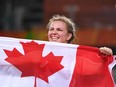 Canada's Erica Elizabeth Wiebe celebrates after winning against Kazakhstan's Guzel Manyurova in their women's 75kg freestyle final match on August 18, 2016 in Rio de Janeiro.