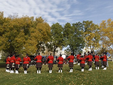 Multiservice pipes and drums players warm up for Alberta's Police and Peace Officers' Memorial Day at the Alberta Legislature in Edmonton, on September 25, 2016.