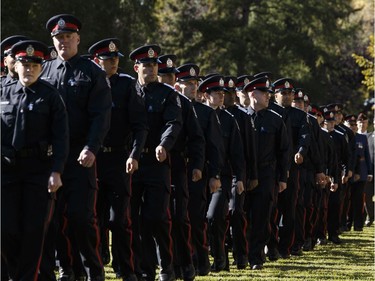 Edmonton Police Service officers march during Alberta's Police and Peace Officers' Memorial Day at the Alberta Legislature in Edmonton on September 25, 2016.