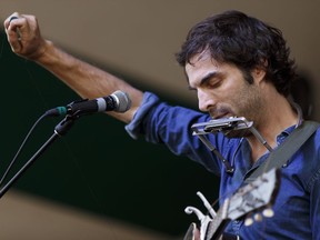 Brad Barr of The Barr Brothers performs on the mainstage during the Edmonton Folk Music Festival at Gallagher Park on Aug. 4, 2016.