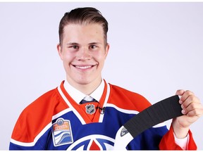 Jesse Puljujarvi poses for a portrait after being selected fourth overall by the Edmonton Oilers in round one during the 2016 NHL Draft on June 24, 2016 in Buffalo, New York.