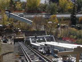 Supports for the urban stairs that will be beside the Funicular track are put into place on Thursday Sept. 22, 2016.