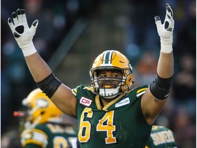 Edmonton Eskimos' Andrew Jones celebrates a touchdown during first half CFL West Division final football action against the Calgary Stampeders in Edmonton, Sunday, Nov. 22, 2015.