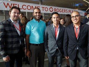 Brandon Polanski, left, Kassam Khakoo, Rob Mella and Mateo Tamano pose for a picture during the official opening of Rogers Place in Edmonton on Thursday, Sept. 8, 2016.