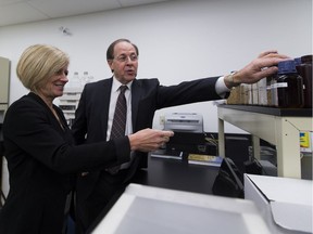 Ceapro President and Chief Executive Officer, Gilles Gagnon gives Premier Rachel Notley a tour of the company's lab after the opening of the Ceapro facility which is the first program supported by Alberta Innovates Bio Solutions to reach full-scale commercial production.