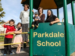 Wetaskiwin parents Danielle Barnsley-Cervo (right), and Ashley Goode (centre) with their children (left to right) Lachlan Goode, 6; Cedar Cervo, 6; Matteo Cervo, 8; and Cormac Goode, nine months. The families successfully asked their public school, Ecole Parkdale, to dispense with a daily recitation of the Lord's Prayer.