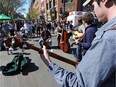 The Misery Mountain Boys play at the Downtown Farmer's Market, which was a very busy place on opening day in May 2013.