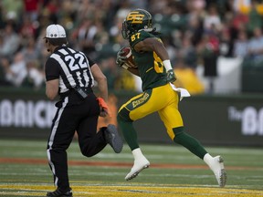 Edmonton Eskimos Derel Walker (87) runs for a touchdown against the  Calgary Stampeders on Saturday, September 10, 2016 in Edmonton. Greg  Southam / Postmedia  (To go with sports story) Photos for stories, columns off Eskimos game appearing in Sunday, Sept. 11 edition.