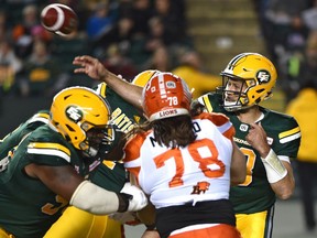 Edmonton Eskimos quarterback Mike Reilly (13) in the pocket gets off a pass against the BC Lions during CFL action at Commonwealth Stadium in Edmonton Friday, September 23, 2016. Ed Kaiser/Postmedia (Edmonton Journal story Gerry Moddejonge) Photos for stories, columns off Eskimos game appearing in Saturday, Sept. 24 edition.